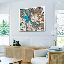 Custom 3D wooden map wall art displayed in modern living room interior