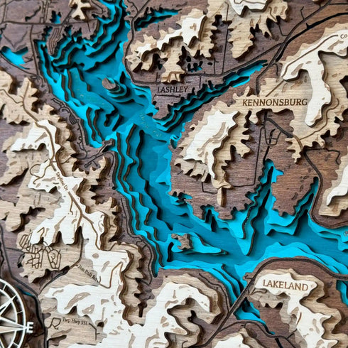 Layered wood nautical map of Senecaville Lake with compass detail