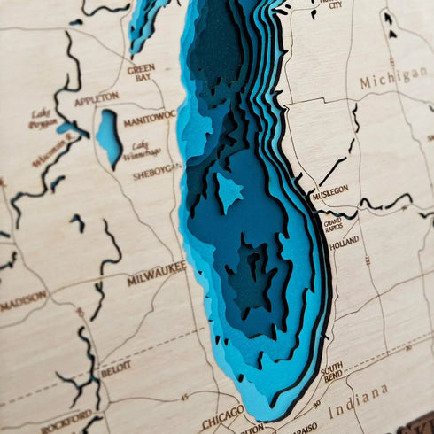 Close-up of Lake Michigan wooden map showing depth contours and shoreline