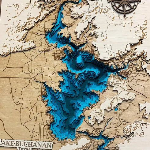 Close-up of Lake Buchanan wooden wall art showing shoreline and depth details.