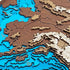 Close-up of Alaska 3D wooden map highlighting Anchorage and mountain ranges