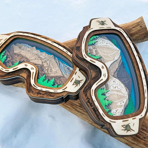 Rustic layered 3D wooden ski goggles with Arapahoe Basin trail map design