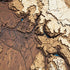 Close-up of handcrafted Arizona wood map with engraved details.