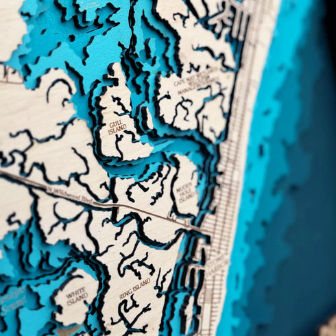 Close-up of Avalon NJ wooden map showing detailed coastline and waterways.