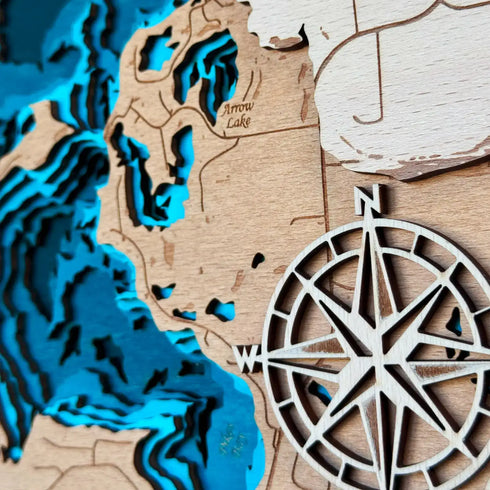 Detailed layered wood artwork of Big Cormorant Lake with blue depth contours