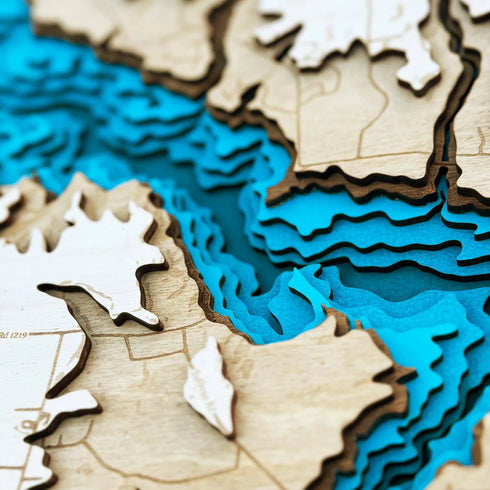 Close-up of Buckhorn Reservoir wooden map highlighting layered water details