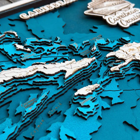 Close-up of Caribbean 3D wooden map showing Cuba, Jamaica, and Bahamas