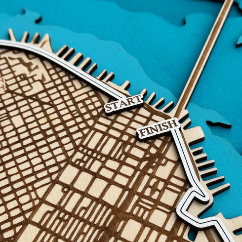 Close-up of start and finish markers on San Francisco marathon wooden wall art.
