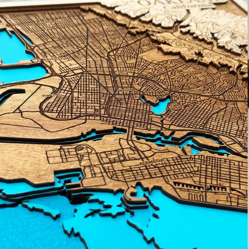 Laser cut wooden map artwork of Oakland city streets and coastline decor
