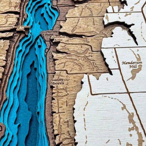 Close up of Conesus Lake 3D wooden map with blue water design
