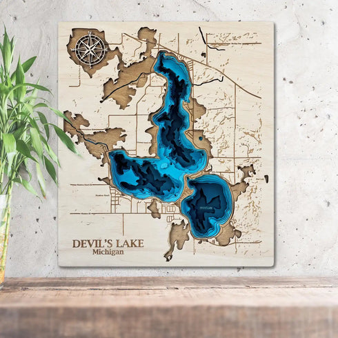3D layered wooden map of Devil’s Lake Michigan hanging on a wall