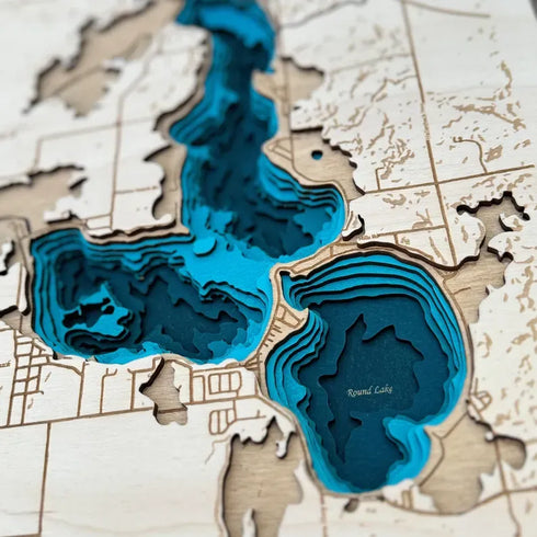 Close-up of Devils Lake wooden wall art with layered water depths