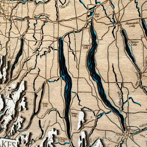 Close-up of engraved Finger Lakes map showing Cayuga and Seneca lakes