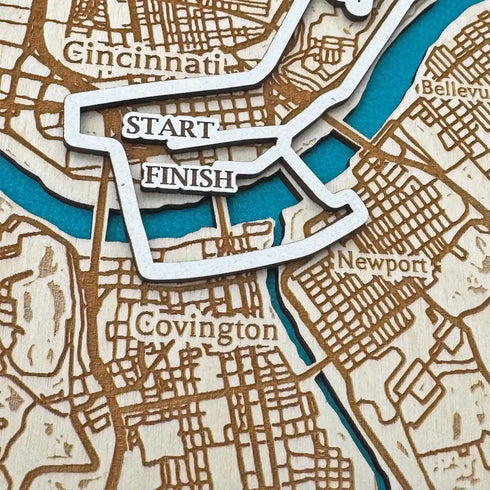 Close up of Flying Pig Marathon 3D wooden map with engraved streets