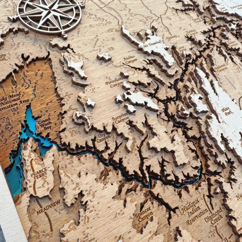 Close up of Grand Canyon wooden map with detailed engraving of cliffs and trails