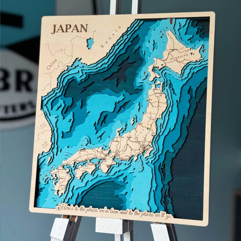 Japan 3D wooden map with layered ocean depth and engraved coastlines