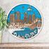 3D wooden skyline map of Kansas City with layered buildings and river