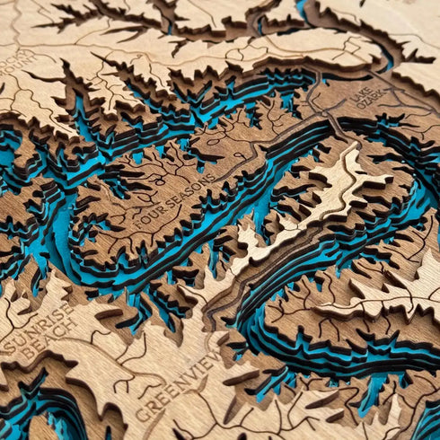 Close-up of Lake of the Ozarks wooden map highlighting Four Seasons area