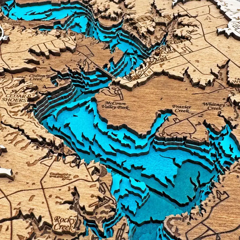 Close-up of Lake Whitney 3D wooden map highlighting McCown Valley Park