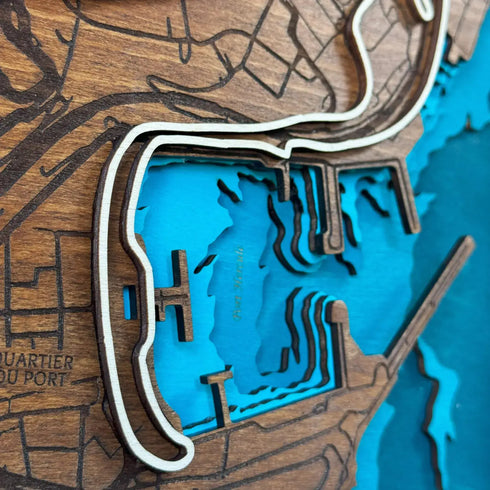 Racing-inspired wooden wall map of Monaco harbor and F1 track.