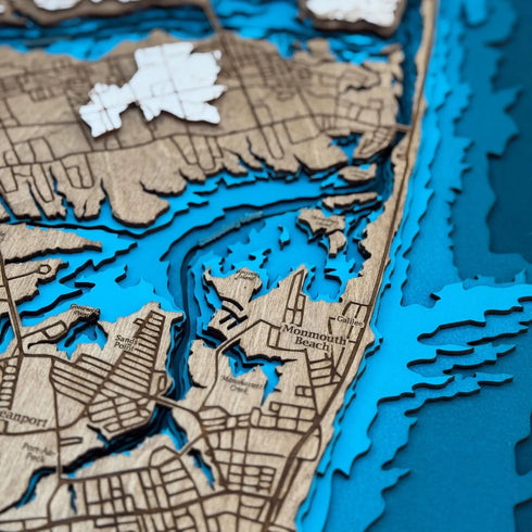 Close-up view of Monmouth Beach 3D wooden map with shoreline details