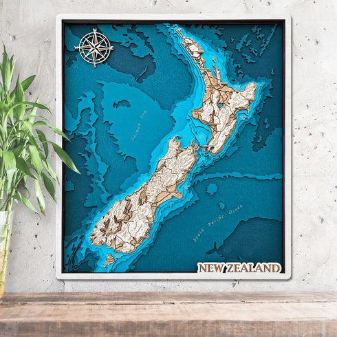 3D wooden map of New Zealand showing topographic layers
