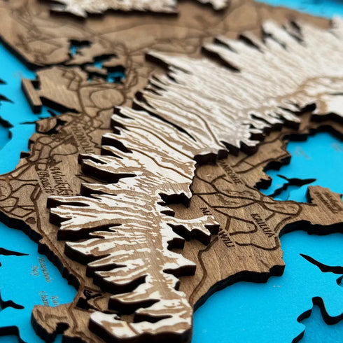 Close-up of layered wood contours highlighting Oʻahu’s coastline.