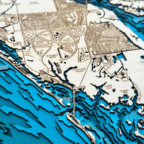 Close-up of Rotonda West wooden wall art with Placida Harbor detail