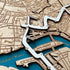 Close-up of Rotterdam Marathon wooden map with engraved start and finish