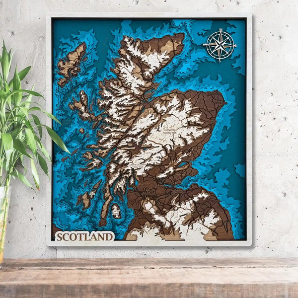 3D wooden map of Scotland with layered coastline and engraved towns