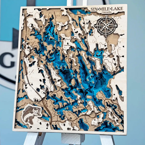 Handcrafted 3D wooden map of Six Mile Lake Ontario with layered blue and natural wood design.