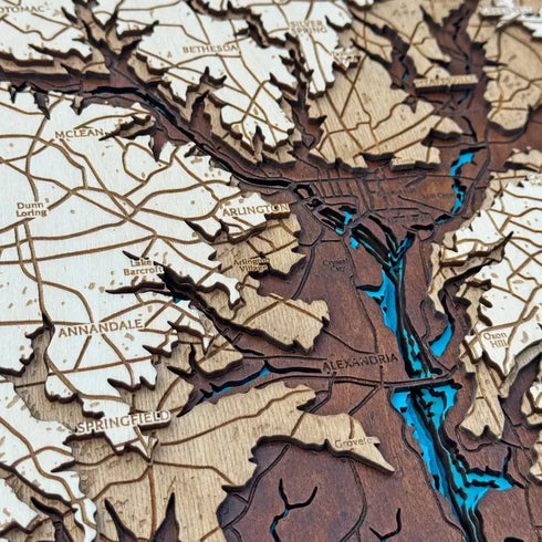 Close-up of handcrafted wooden layers showing Potomac River and neighborhoods
