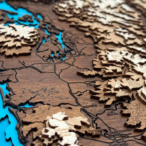 Close-up of Washington State 3D map highlighting Puget Sound and Cascades